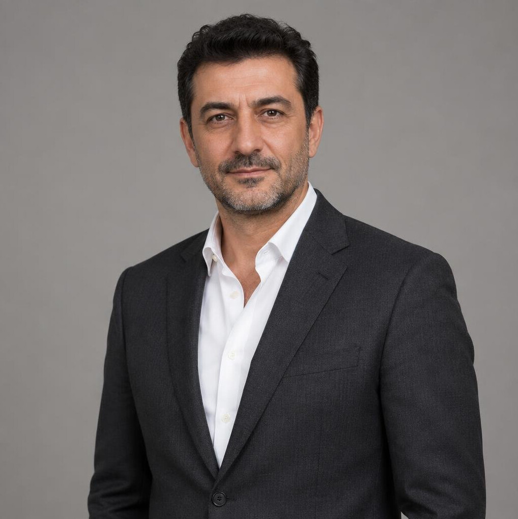 Portrait of a Turkish man in a suit with a calm expression