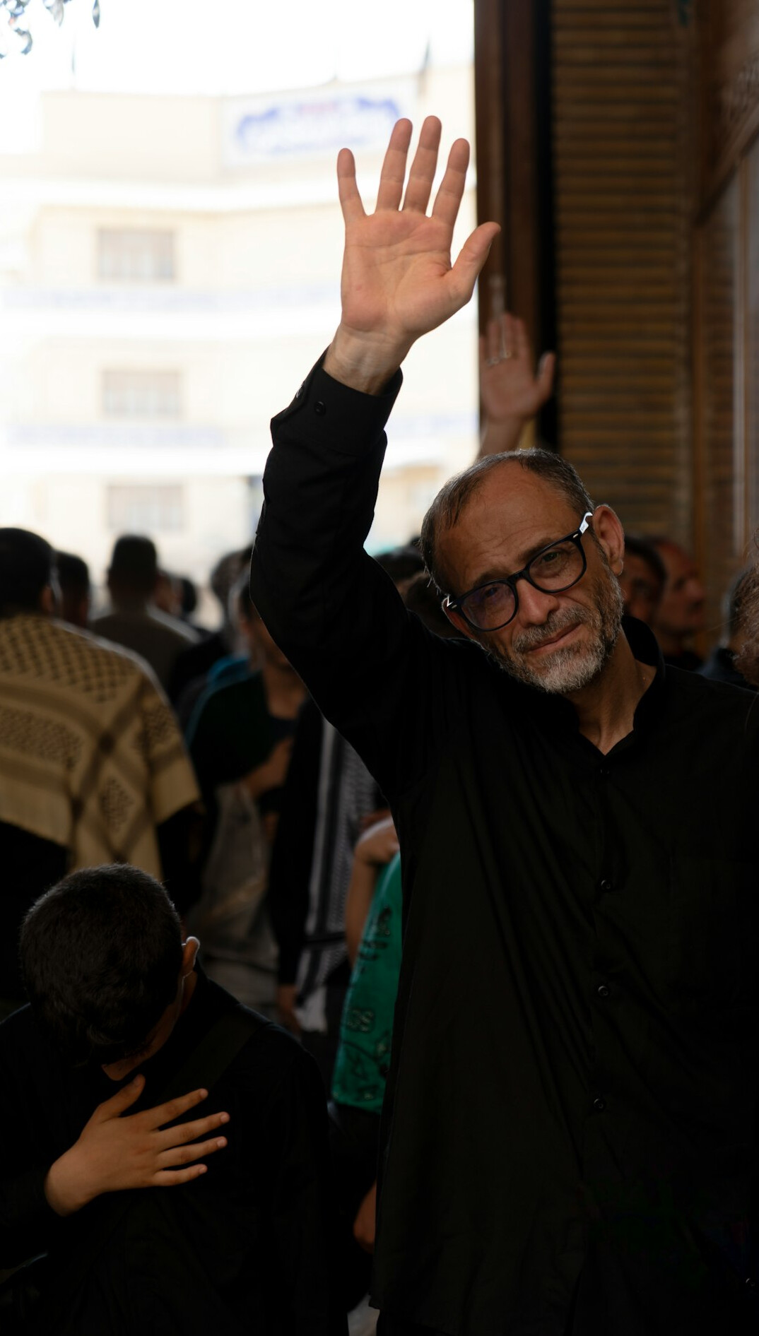 Portrait of a young Turkish man with glasses in a shirt